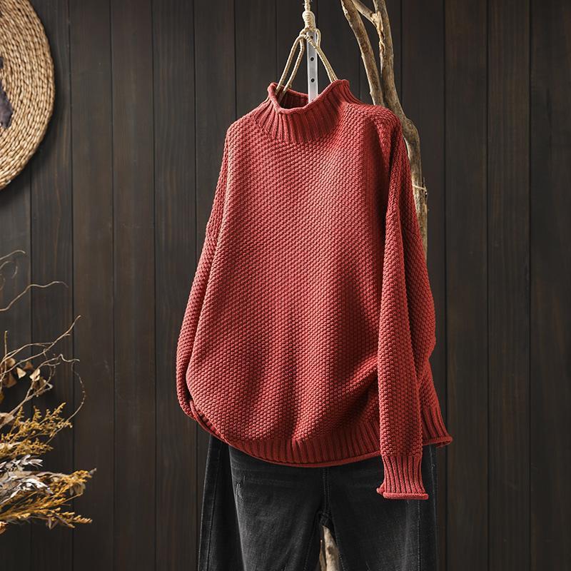Lucy – Pull texturé à col montant au style doux