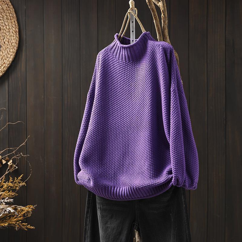 Lucy – Pull texturé à col montant au style doux