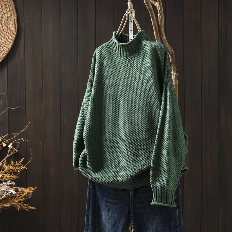 Lucy – Pull texturé à col montant au style doux