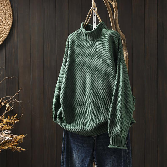 Lucy – Pull texturé à col montant au style doux
