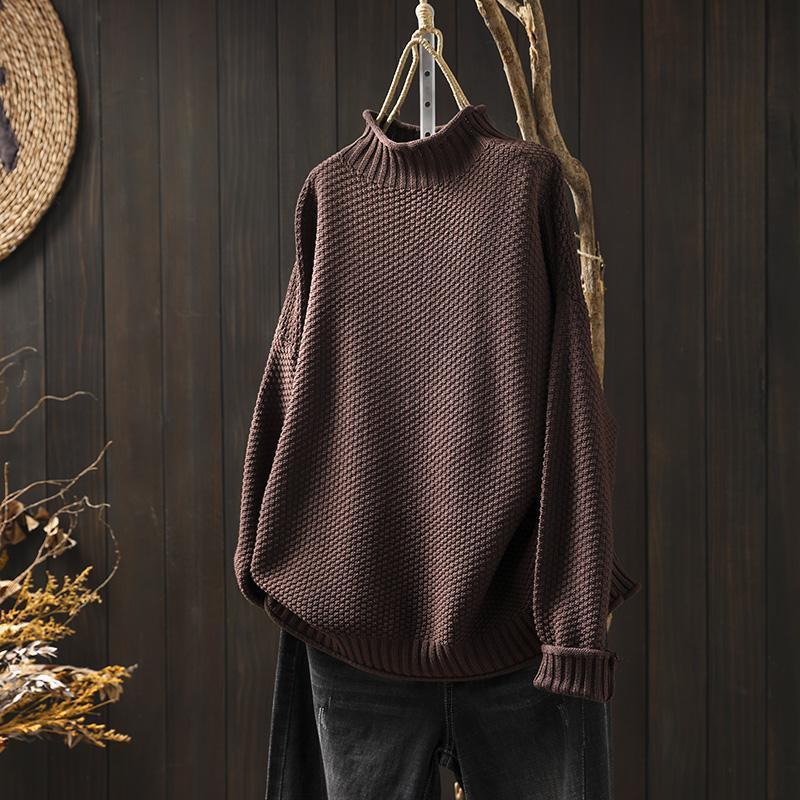 Lucy – Pull texturé à col montant au style doux