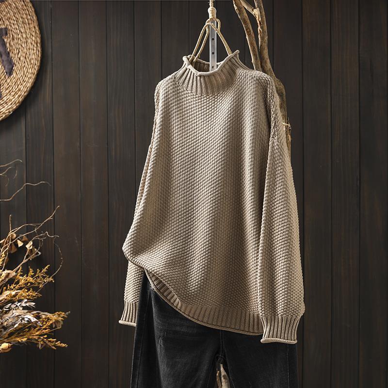 Lucy – Pull texturé à col montant au style doux