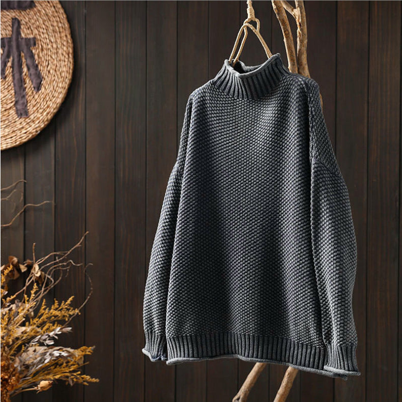 Lucy – Pull texturé à col montant au style doux